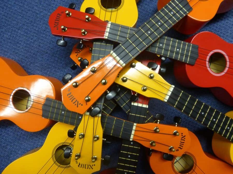 ukuleles of different colors
