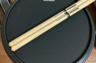 Drumsticks on the drum pad
